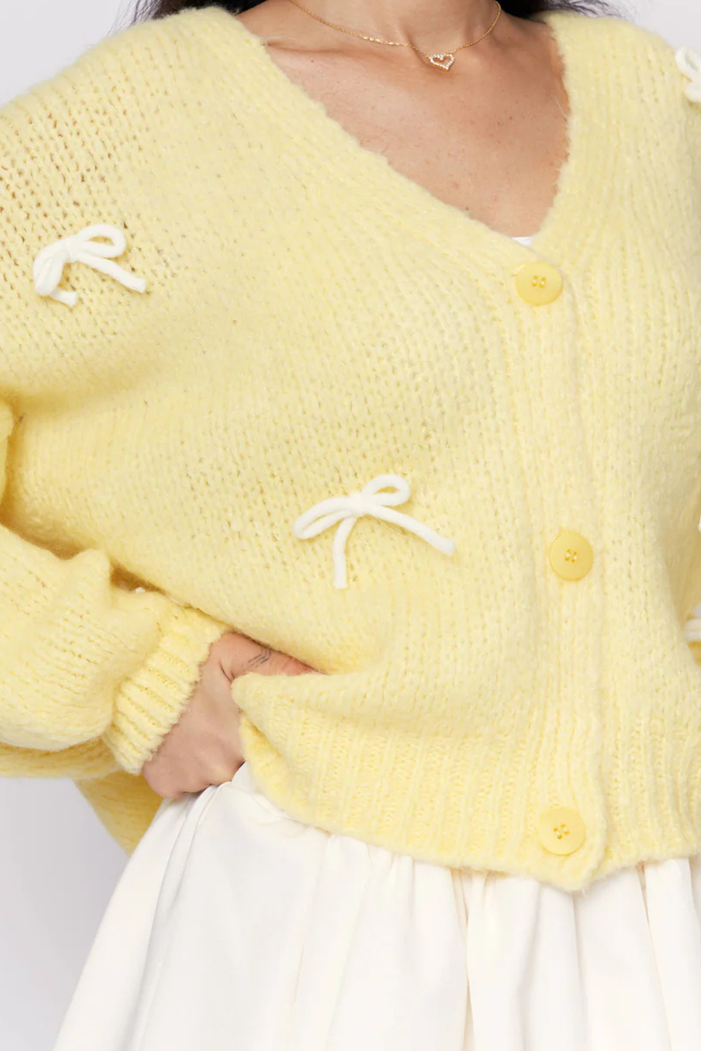 Liela izmēra mini kardigans ar bantīti