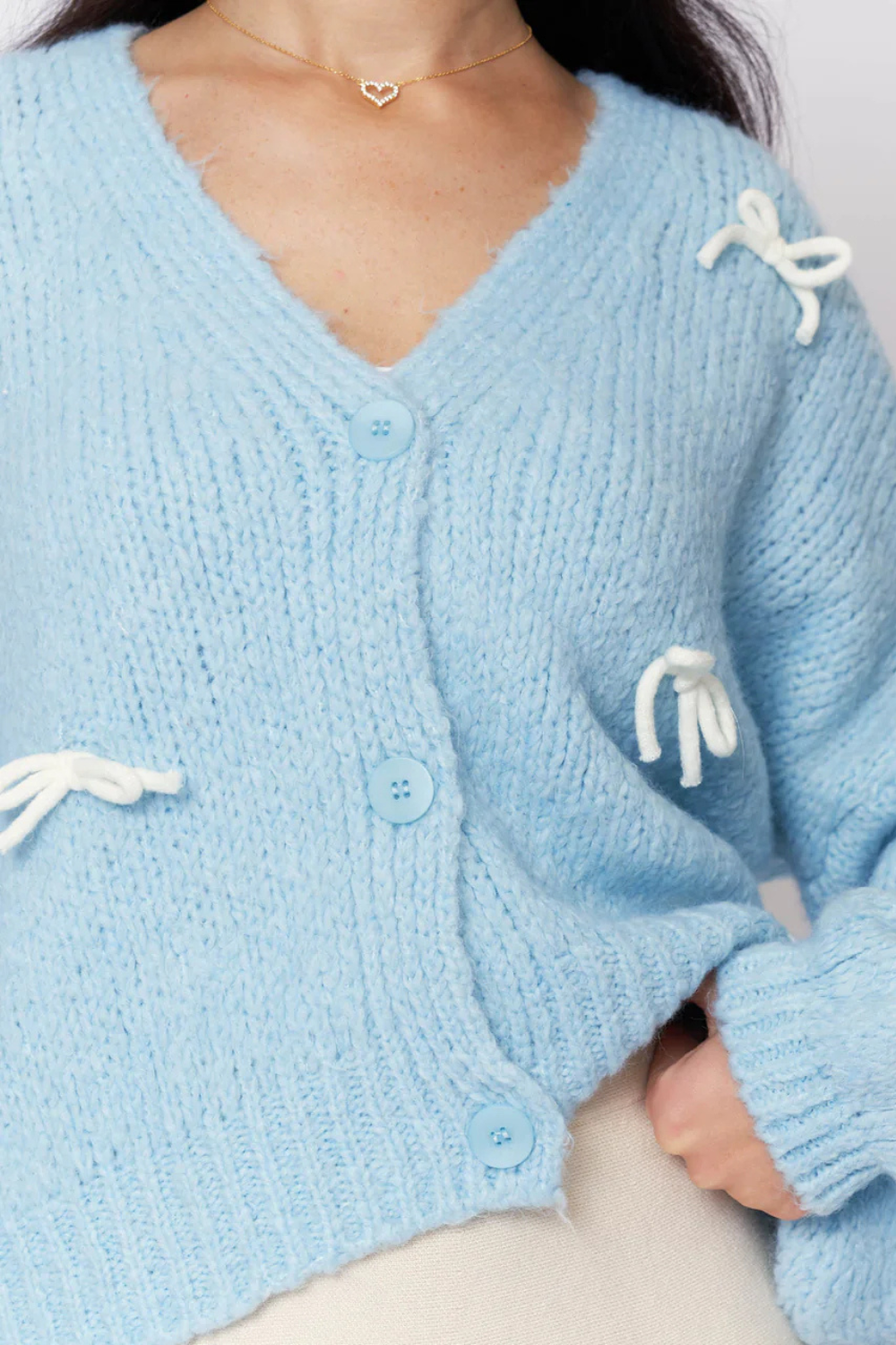 Liela izmēra mini kardigans ar bantīti