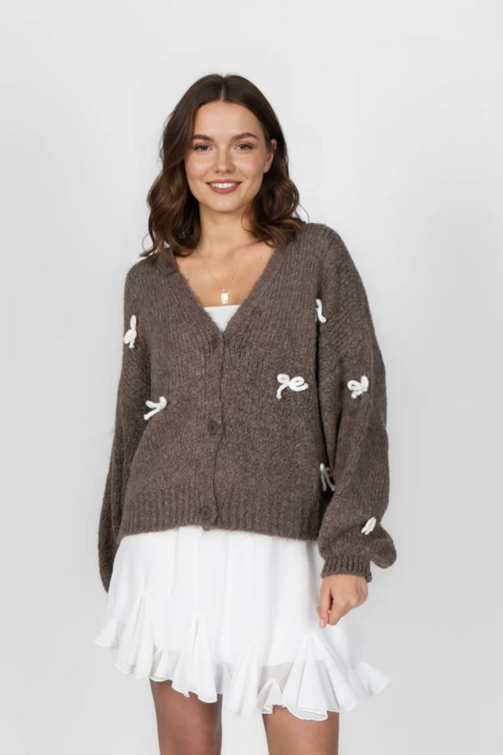 Liela izmēra mini kardigans ar bantīti
