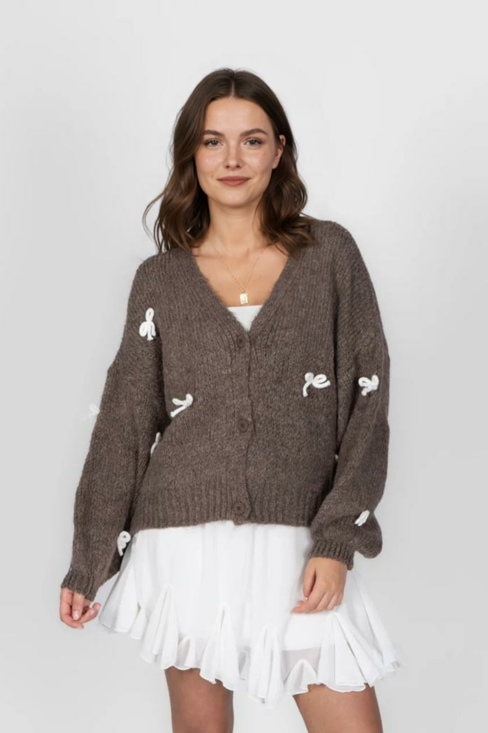 Liela izmēra mini kardigans ar bantīti