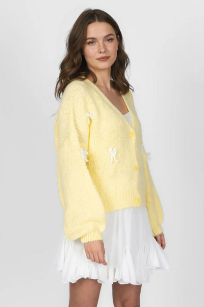 Liela izmēra mini kardigans ar bantīti