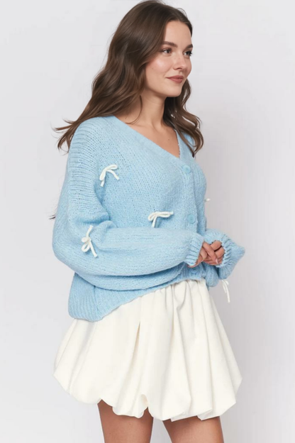 Liela izmēra mini kardigans ar bantīti