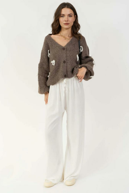 Liela izmēra mini kardigans ar bantīti