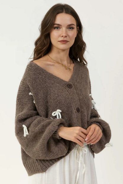 Liela izmēra mini kardigans ar bantīti